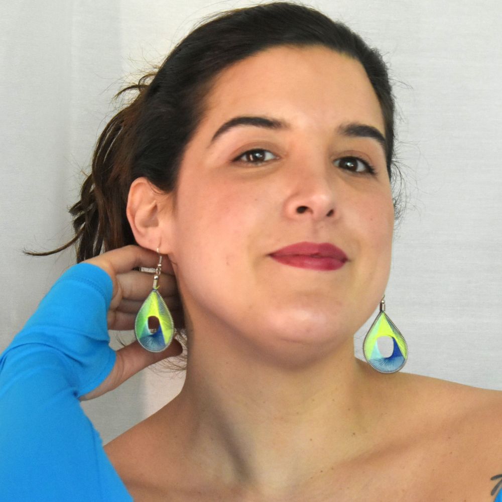 model with thread earrings