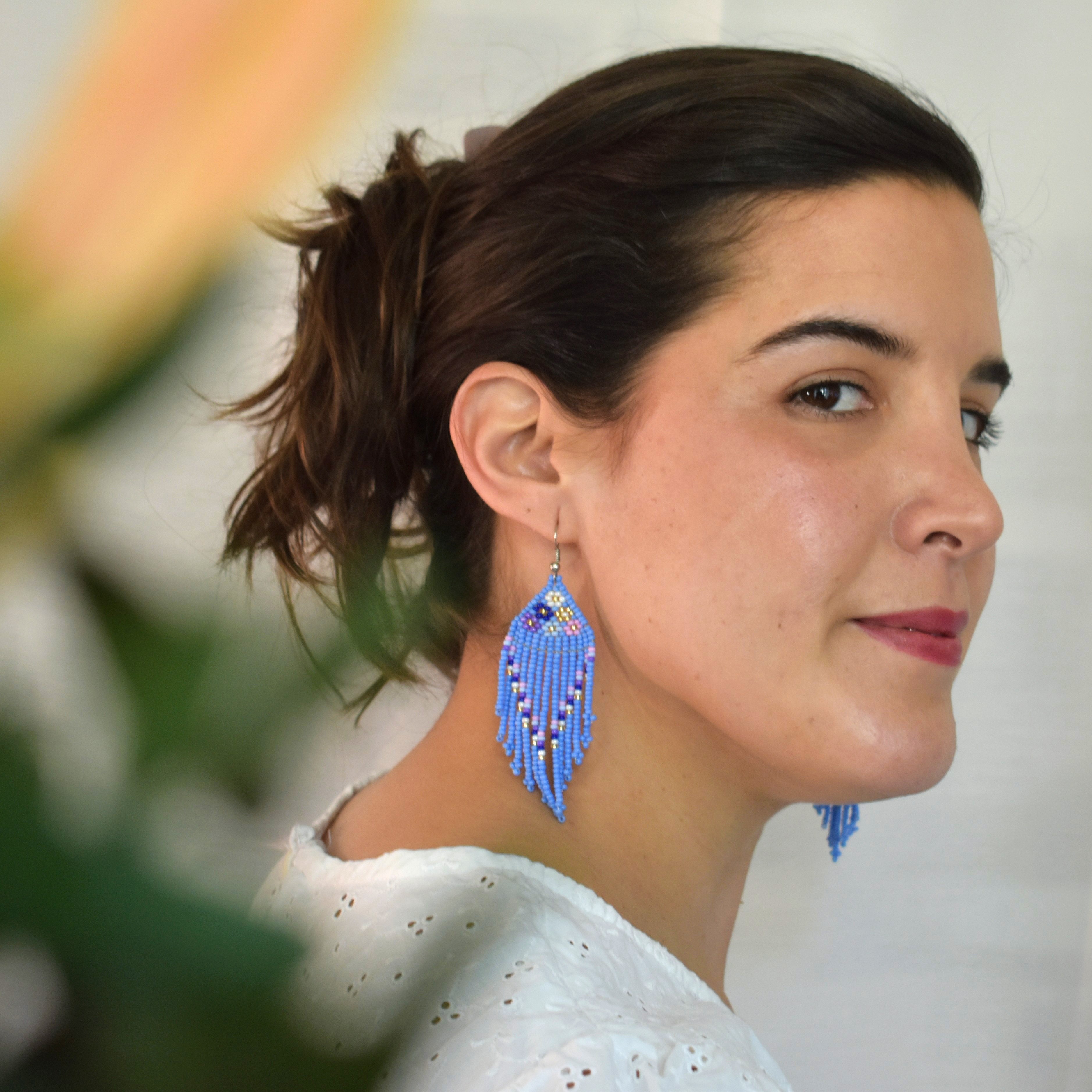 model wearing purple Floral Beaded Fringe Earrings